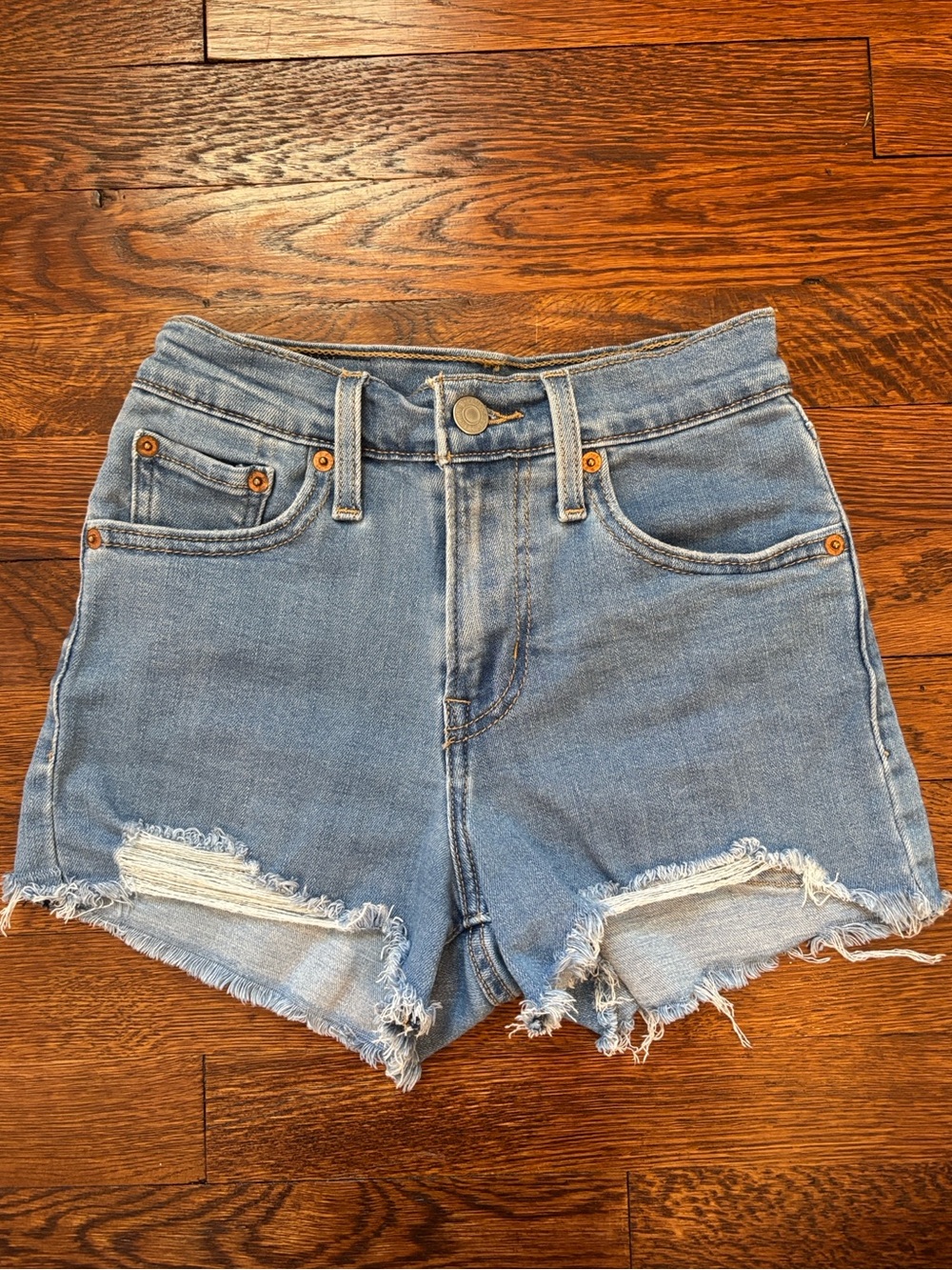 Levi's High Waisted Stretch Denim Distressed Cutoff Shorts - Light Blue